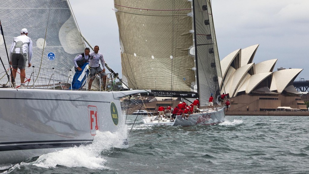 Wild Oats XI & Alfa Romeo approaching the Opera House on the first lap of the 2009 Solas Big Boat Challenge ©  Rolex/Daniel Forster http://www.regattanews.com